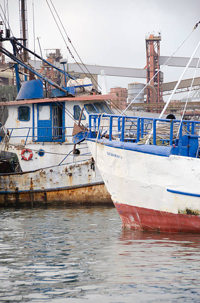 istock Rusty Fishing Ships Anchored 530205405