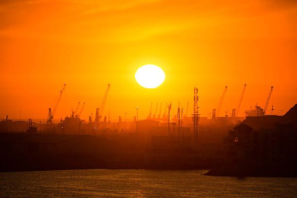 ships and cranes in port of Agadir at sunset, Morocco