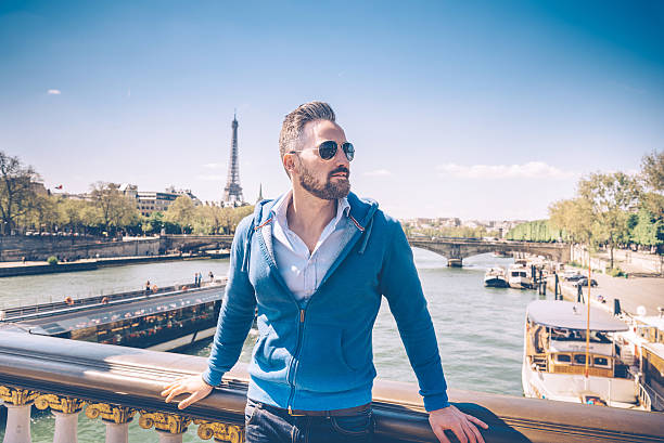 istock bearded man with sun glasses on Pont Alexandre in paris 530209444