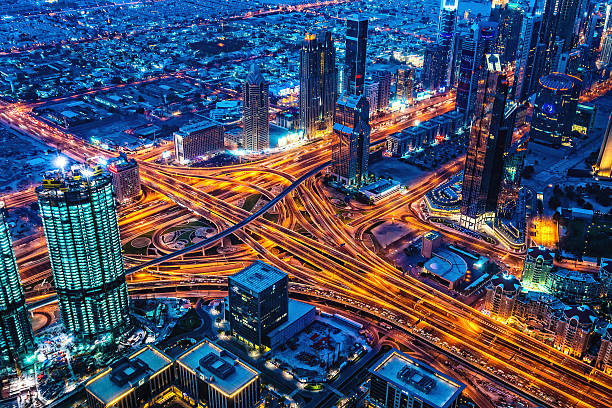 nowoczesny miejski krajobraz dubaju o zmierzchu, zjednoczone emiraty arabskie - night cityscape dubai long exposure zdjęcia i obrazy z banku zdjęć