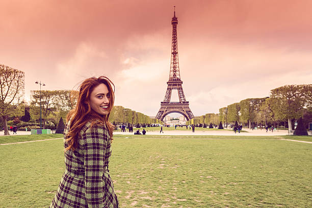 istock Attractive woman enjoying the Eiffel tower 530212546