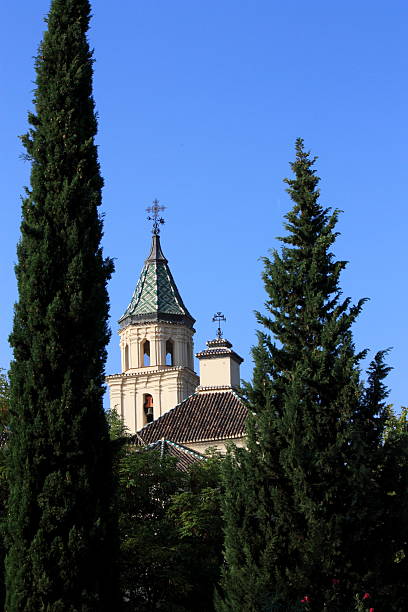 istock Campanario_entre_Cipreses 530212860