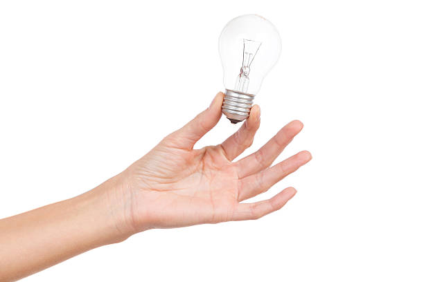Light bulb in woman's hand