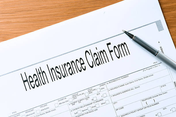 istock health Insurance claim form on table 530234619