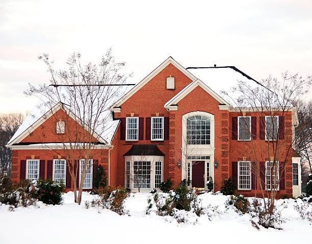 istock Modern Red Brick House in Snow 530234843