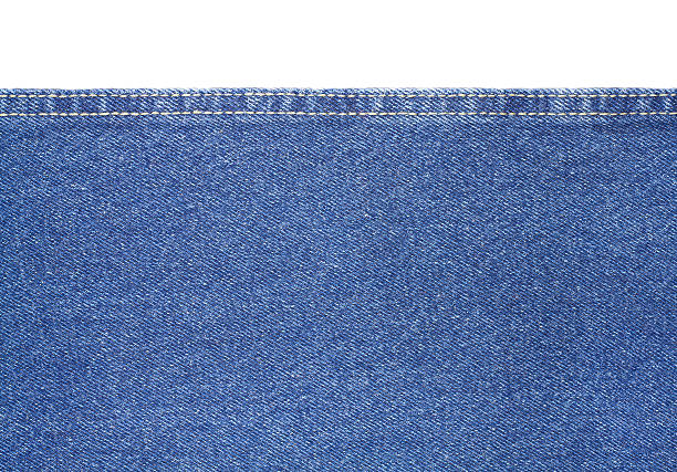 istock Texture of blue jeans fabric isolated on white 530236277