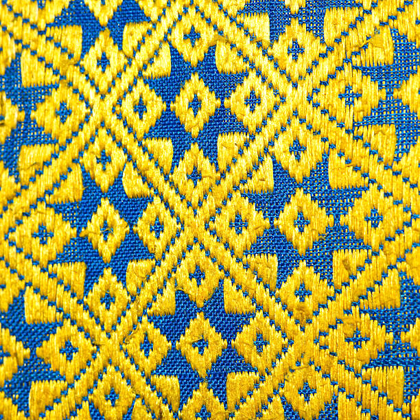 istock Colorful thai peruvian style rug surface close up. 530237017