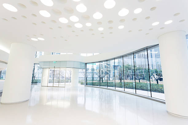 istock futuristic modern office building interior in urban city 530238761