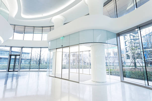 istock futuristic modern office building interior in urban city 530238767