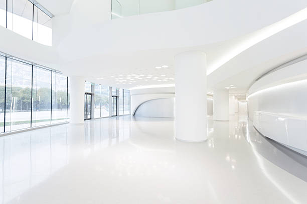 istock futuristic modern office building interior in urban city 530238769
