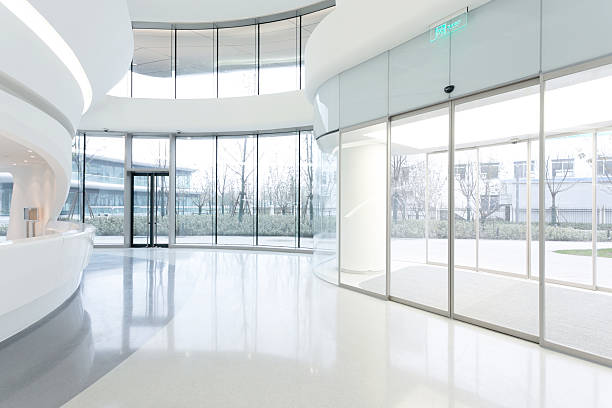 istock futuristic modern office building interior in urban city 530238773