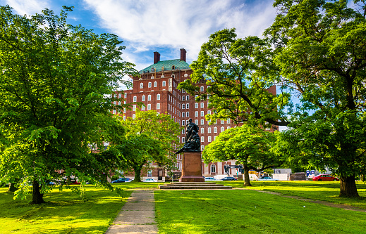 Small park and an apartment building in Baltimore, Maryland.