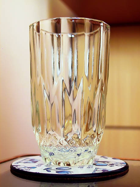 istock Glass cup on the mat 530239225