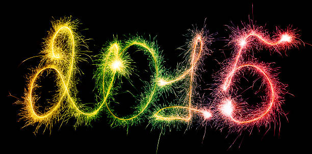 istock Happy New Year - 2015 with sparklers 530240309