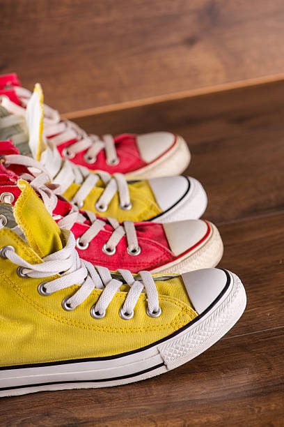 istock multicolored youth gym shoes on floor 530251671