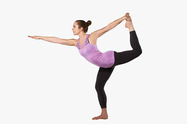 istock Young Woman Practicing Yoga 530253049