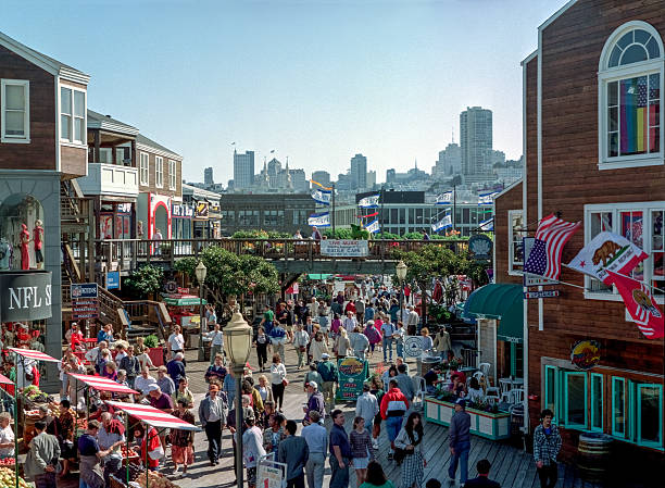Pier 39 in 1994 People at Pier 39 of San Francisco in 1994.Pier 39 is a popular place for tourists with shops,restaurants and cruise tours around the Bay. fishermans wharf stock pictures, royalty-free photos & images