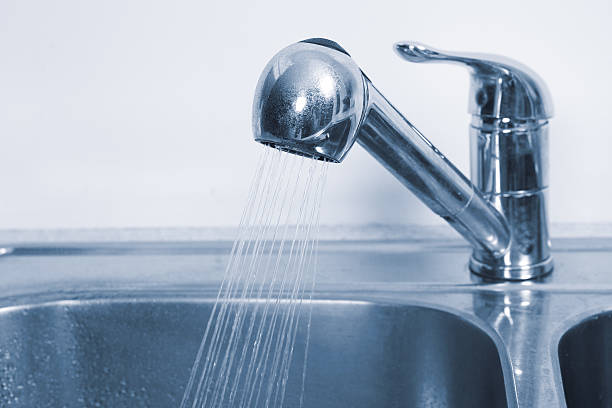 istock Kitchen Water tap and sink. 530257929