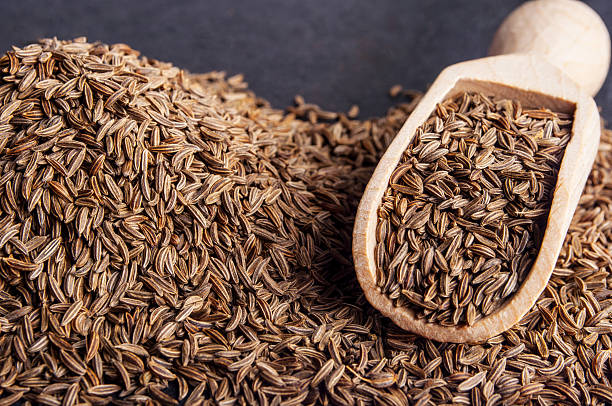 istock Wooden shovel with caraway-seeds 530258265