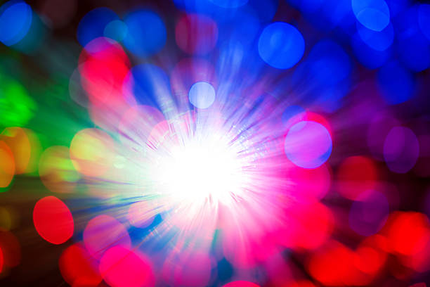 istock Blurry background with optical fibers 530258591