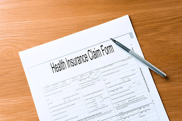 istock health Insurance claim form on table 530259099