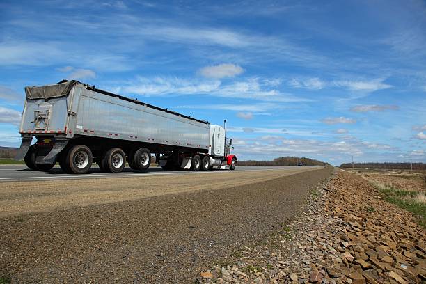 istock Semi-truck delivering its load 530260959