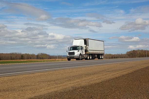 istock Semi-truck delivering its load 530260963