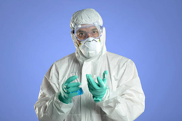istock Scientist with Hazmat suit 530263931