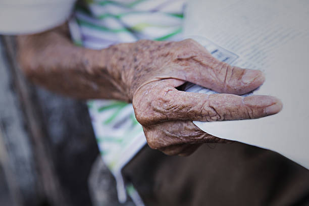 istock Hand of an old man 530264367