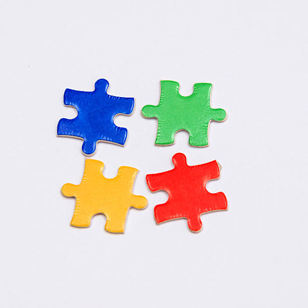 istock four piece of puzzles 530270091