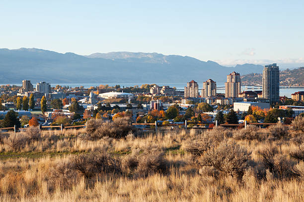 Kelowna British Columbia, Okanagan Knox Mountain early morning sunrise Early morning light hitting beautifull Kelowna, British Columbia from Know Mountain. Autumn and fall colors. This image was taken from a tripod, iso 100, f16, 1/10th sec, plus .3 stop. kelowna-autumn stock pictures, royalty-free photos & images