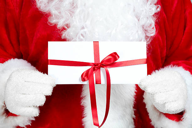 istock Christmas  Santa Claus with gift 530273073