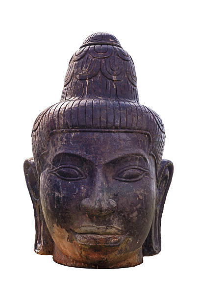 Sculpture ancient of head buddha isolated on white background