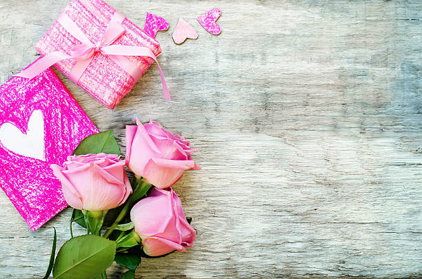 istock Valentine's background with a gift, flower and card 530284645