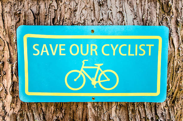 istock Bike public information sign  on tree background 530285365