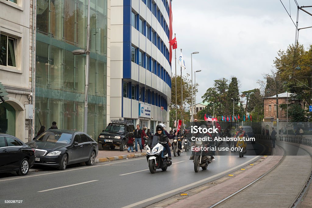 Patriotic Mororbikers, Republic Day, Galata, Beyoglu, Istanbul Istanbul, Turkey - October 29th, 2014:Republic Day, Patriotic Turkish motorbikers with flags driving on the Kemeralti Cd., Galata, Beyoglu, Istanbul - European side. Driving Stock Photo