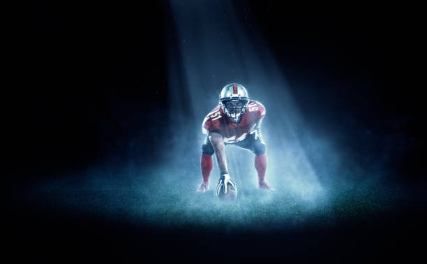istock American football player in spotlight 530298111