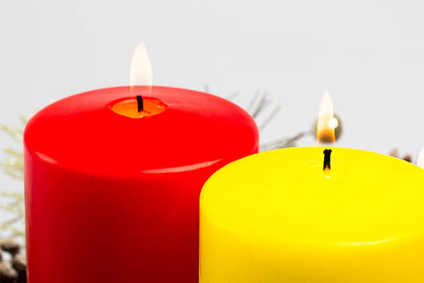 istock two candles in a Christmas decoration 530298829