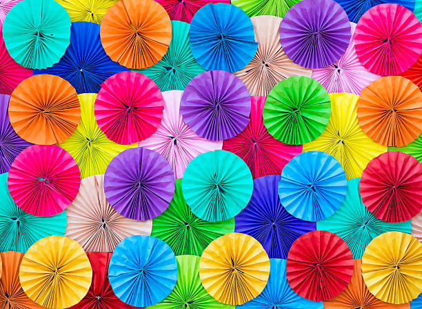 istock Colored paper, folded in a circle Ornamental decorated backgroun 530301855