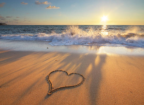 Heart on beach stock photo