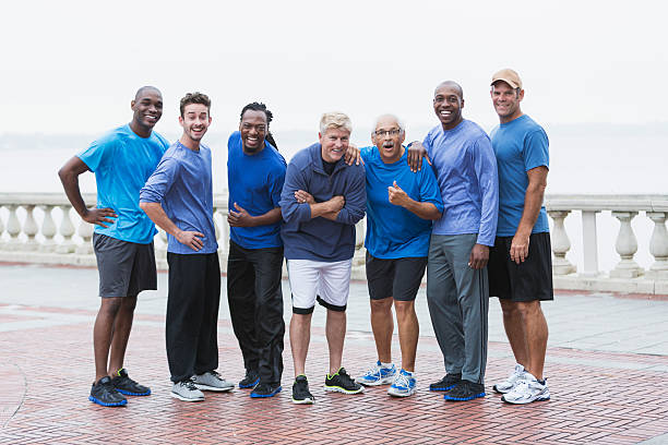 istock Diverse group of men standing in a row, surprised 530307789