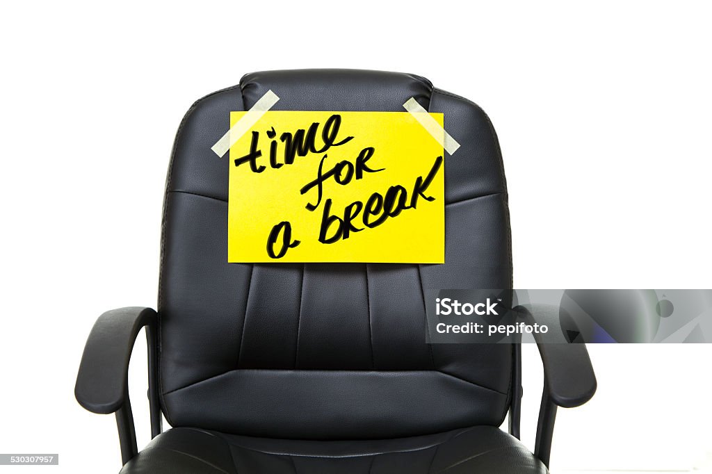 Time for a Break black leather office chair with yellow paper isolated on white background Banner - Sign Stock Photo