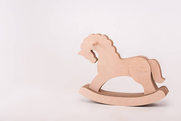 istock Child with the toy horse 530308559