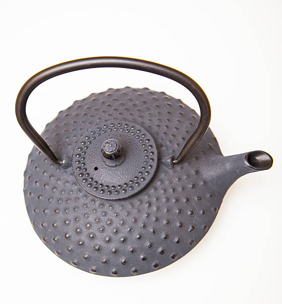 istock Vintage Asian teapot on white background 530311989