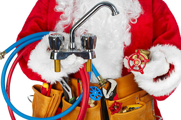 Santa Claus with a tool belt. stock photo