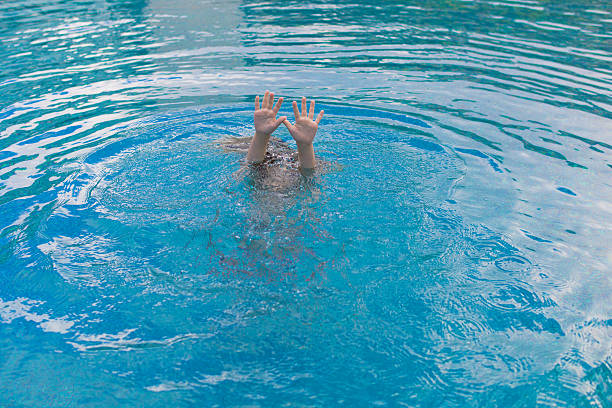 Child drowning stock photo