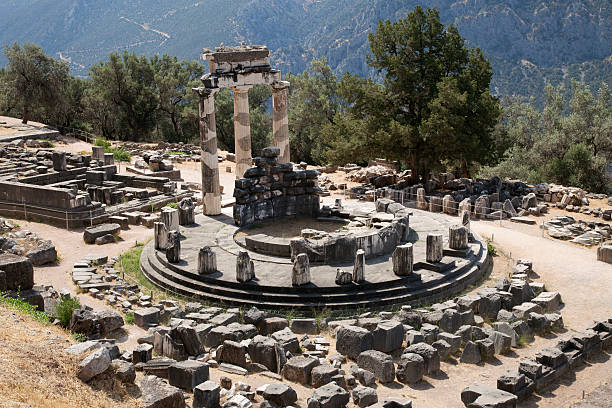 Ancient greek ruins of Delphi with wooded landscape Archaeological site of Delphi in Greece. Sanctuary. Sacred place. archaelogy stock pictures, royalty-free photos & images