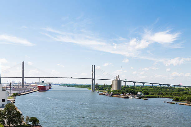 istock Suspension Bridge Over Shipping Port 530314007