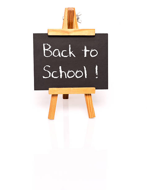 istock Back to school. Blackboard with text and easel. 530314293