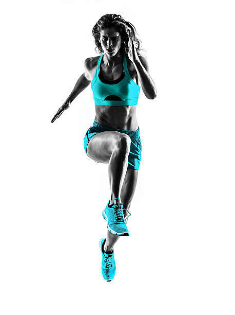 donna di corridore in esecuzione jogging jogger silhouette - women action jumping running foto e immagini stock